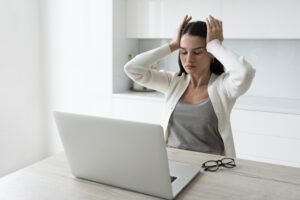 Stressed Women frustrated with electronic devices